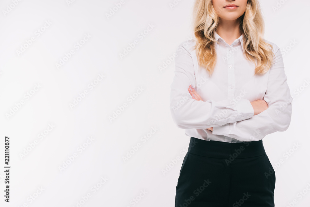 cropped image of businesswoman standing with crossed arms isolated on white cropped image of businesswoman standing with crossed arms isolated on white
