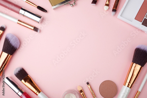 Papier peint Fashion Makeup Cosmetic accessories on pink background