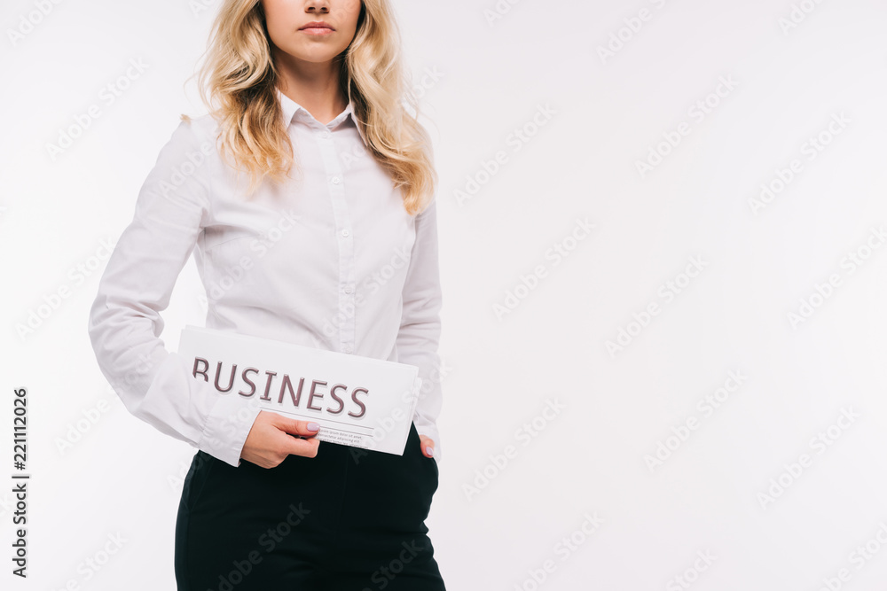 cropped image of businesswoman holding business newspaper isolated on white cropped image of businesswoman holding business newspaper isolated on white