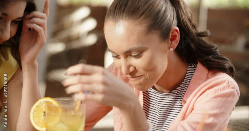 Group of multiethnic friends sitting at table in cafe outdoors, chatting, laughing, enjoying their time 4k Group of multiethnic friends sitting at table in cafe outdoors, chatting, laughing, enjoying their time 4k