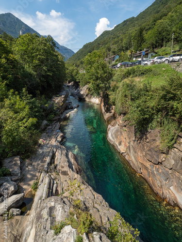 Mountain river Verzasca with emerald green water in the valley, Southern Part of Switzerland. August, 2018