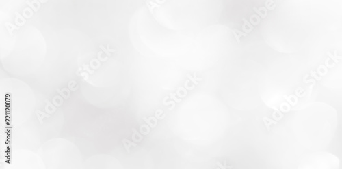 A brilliant blurry white background for a festive mood. Template for greeting card for entertainment.