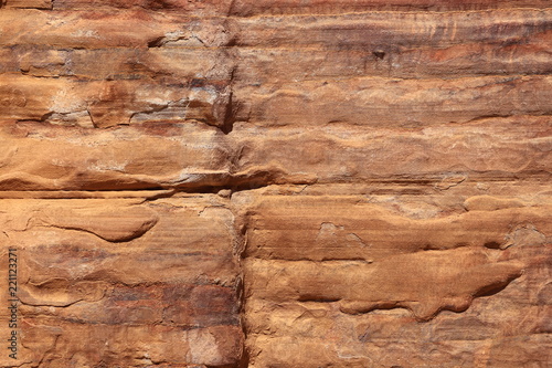 Colorful, red sandstone formation texture. Abstract geological pattern. Petra, Jordan, Middle east