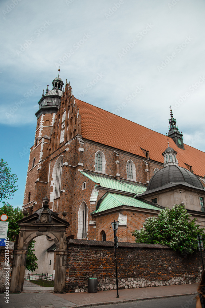 Churches in Poland. Ancient houses in European cities. Church.