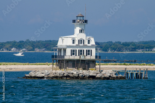 Long Beach Bar Light is a lighthouse off Orient, New York. It was originally a screwpile lighthouse that was later converted to concrete caisson foundation. 