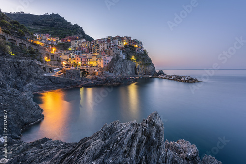 Italy, Liguria, La Spezia, Cinque Terre National Park, Manarola in the evening light photo