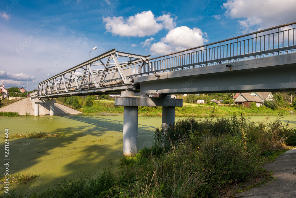 Obraz premium panorama view near big huge bridge across river