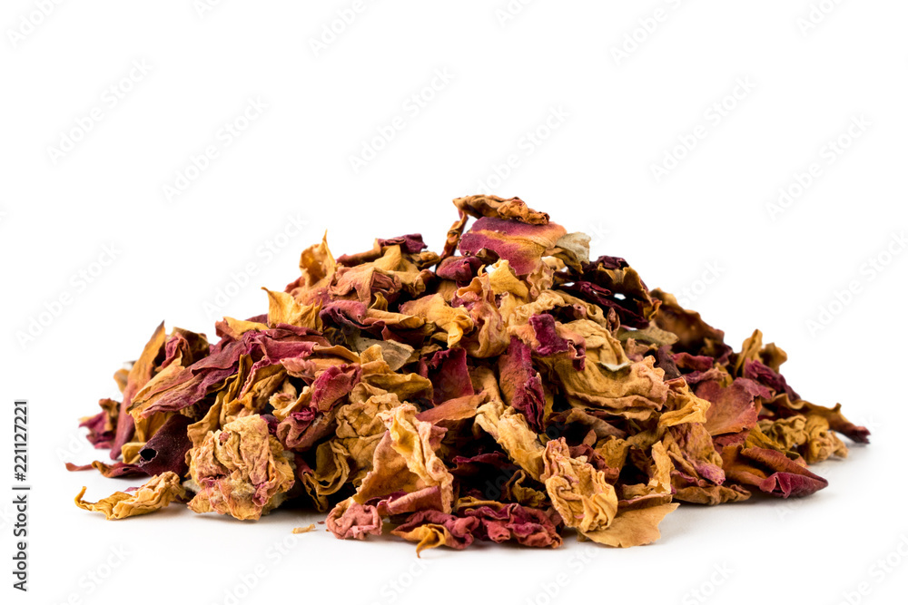 Bunch of dried rose leaves on a white, isolated. Additive in tea Bunch of dried rose leaves on a white, isolated. Additive in tea