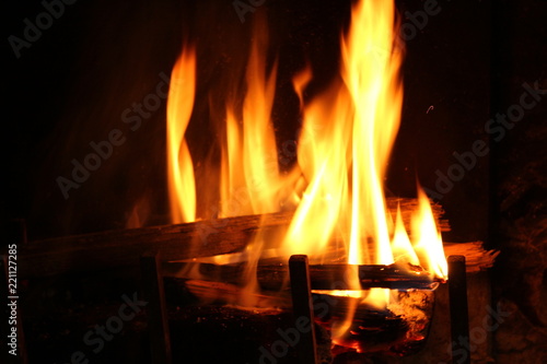 Fire crackling in the fireplace: autumn cozy atmoshpere © laura