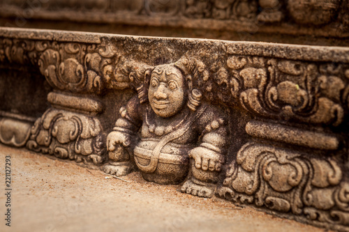 Bahirawa stone carving in intricate detail at sacred site in Anuradhapura, Sri Lanka photo