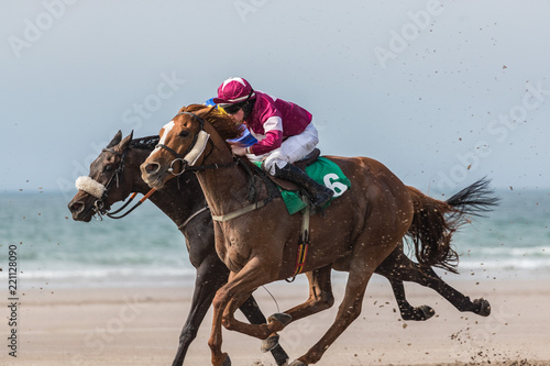 Horse racing on the beach, the wild atlantic way on the west coast of Ireland