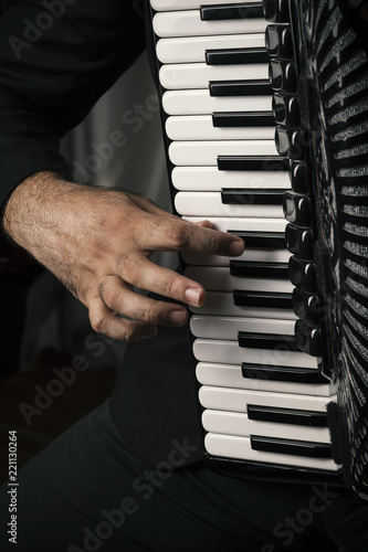 play the accordion
