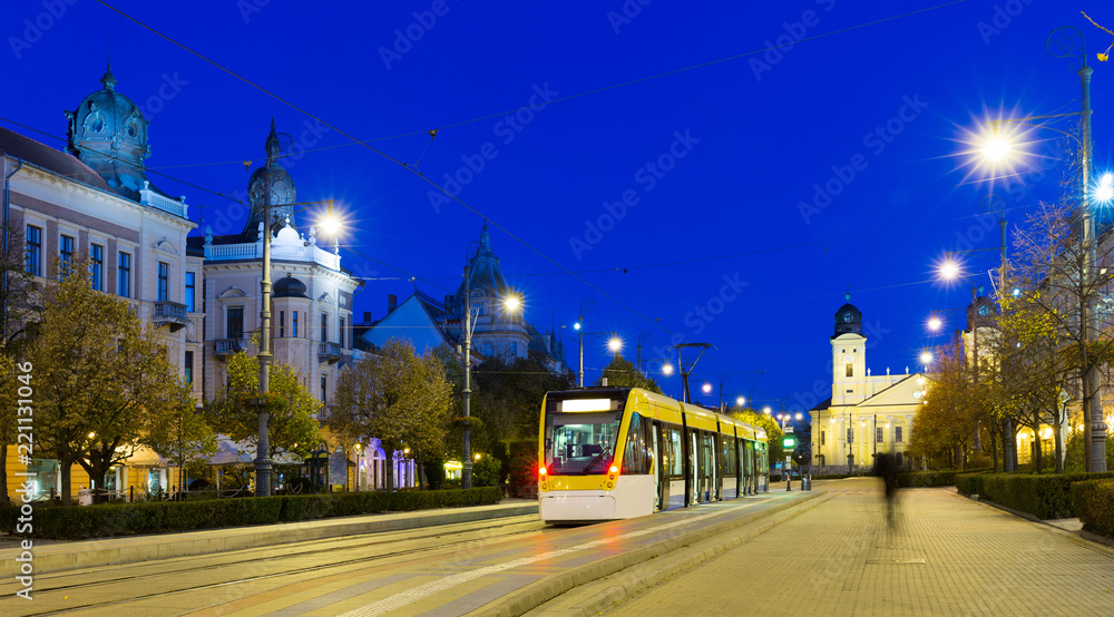 Debrecen streets with Great Protestant Church at night