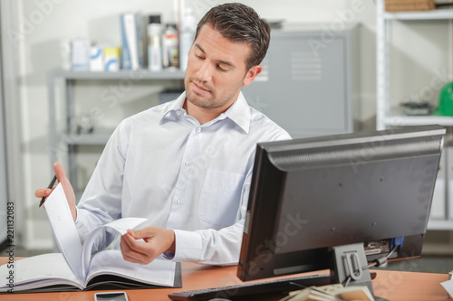 Man reading at his desk