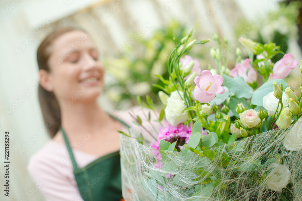 Florist selling a bunch of flowers Florist selling a bunch of flowers