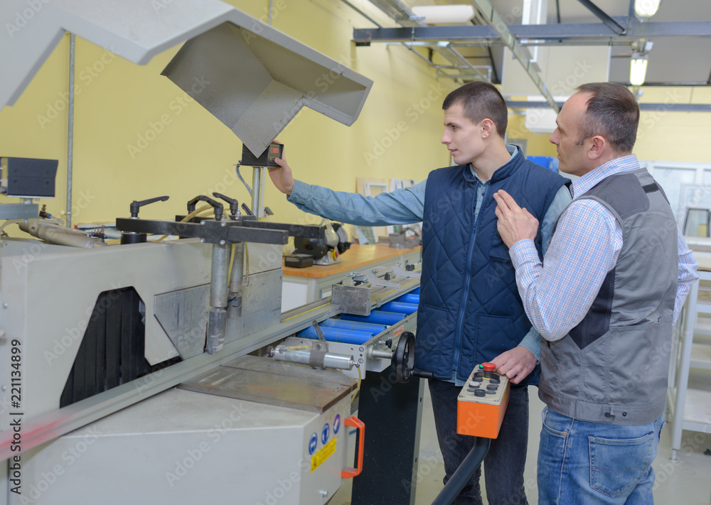 engineer and apprentice in factory engineer and apprentice in factory