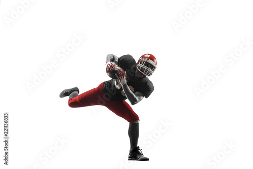 Active one american football player isolated on white background. Fit caucasian man in uniform jumping over studio background in jump or motion. Human emotions and facial expressions concept © master1305