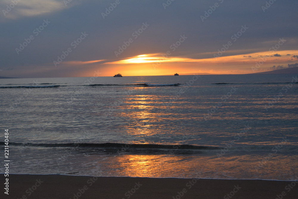 Sunset over the Pacific from Baby Beach in Lahaina, Maui.