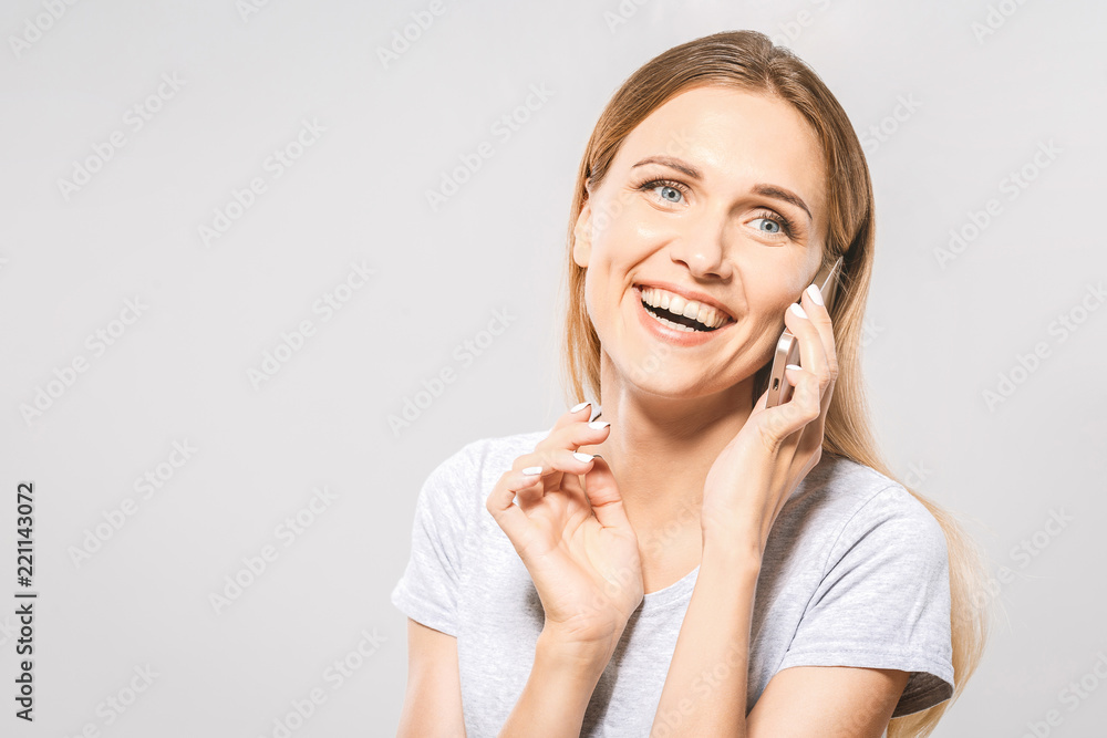 Portrait of Beautiful Young casual woman using mobile phone isolated on white background Portrait of Beautiful Young casual woman using mobile phone isolated on white background