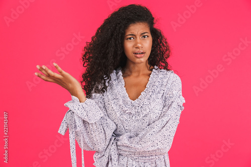 Portrait of a confused young african woman