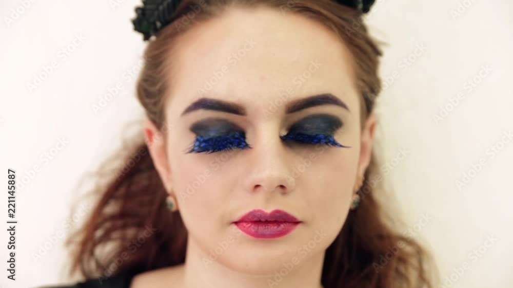 girl with fashion make up and false eyelashes girl with fashion make up and false eyelashes