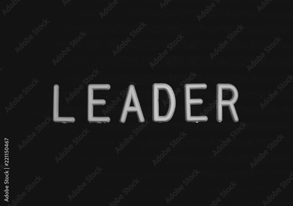 Word leader written on the letter board. White letters on the black background
