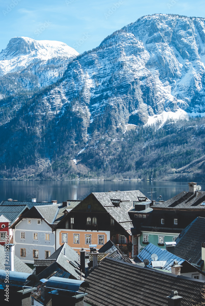 Black roofs of houses located throughout the hill. Hallstatt village in Austria