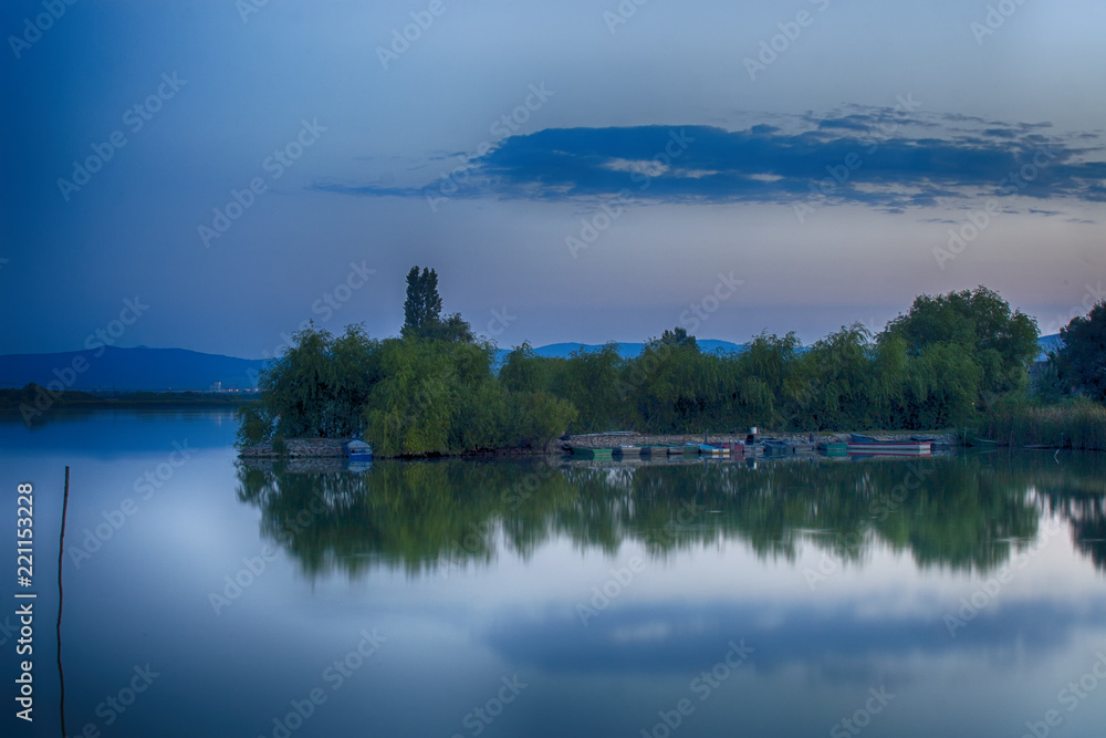 Beautiful landscape about a lake at dawn