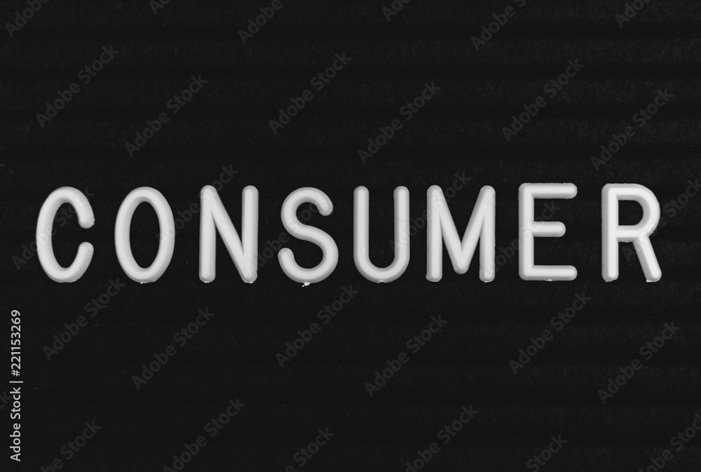 Word consumer written on the letter board. White letters on the black background Word consumer written on the letter board. White letters on the black background