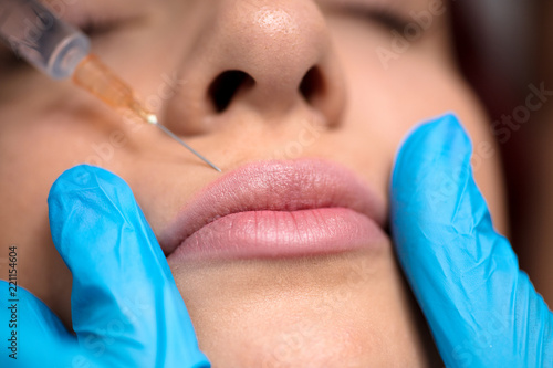 Woman having Botox treatment in beauty salon