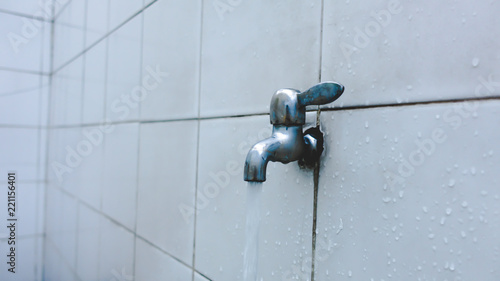 Close-up shot of pipe water in Ablution area in mosque 