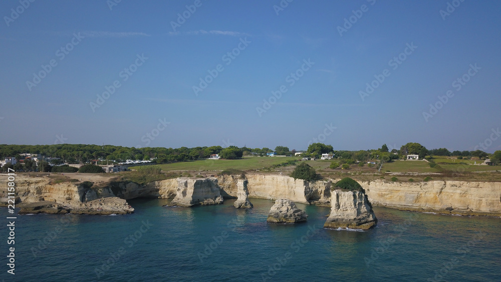 Italian coast aerial view with drone shot in Puglia - Salento - Torre dell'Orso
