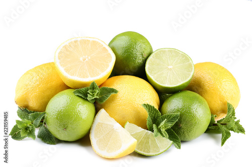 Lemons and limes with mint leafs on white background