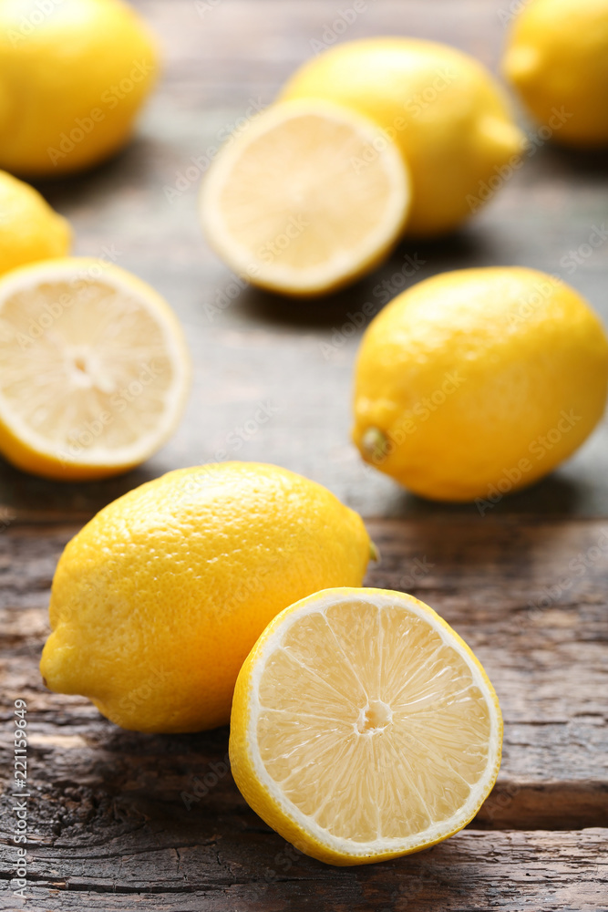 Ripe lemons on grey wooden table Ripe lemons on grey wooden table