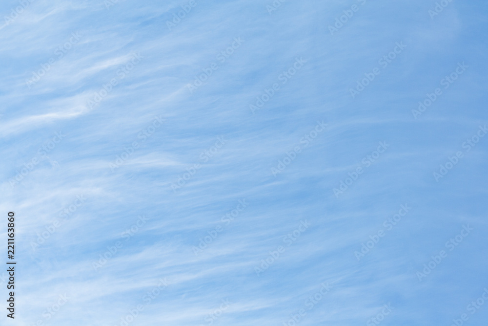 Abstract view of a white feather clouds in light blue sky as background