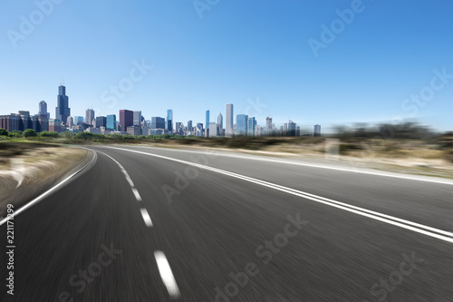 asphalt highway with modern city in chicago