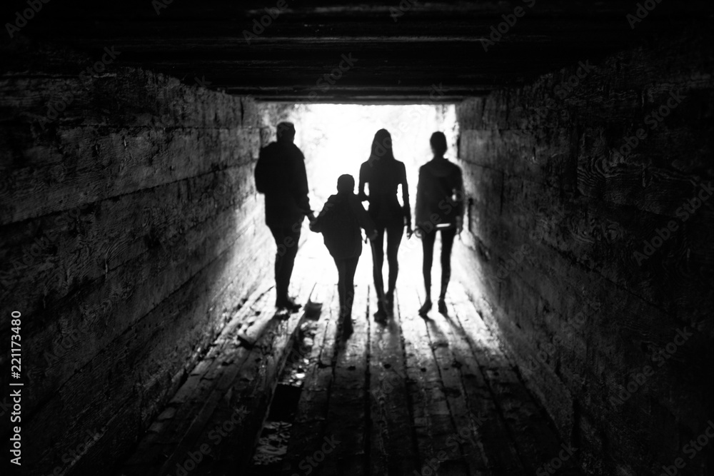 tourists in the wooden sluice of the dam