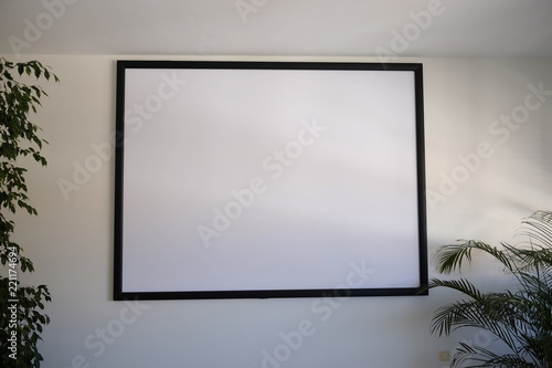 screen for video projector in the meeting room photo