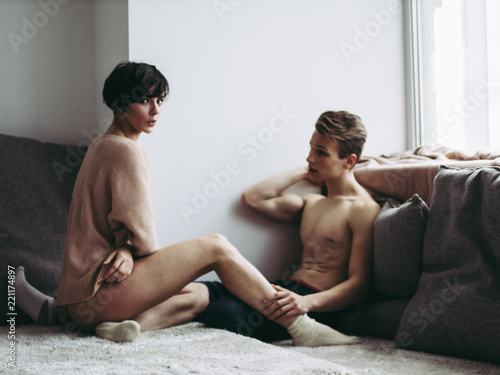 Young beautiful couple hugging. A man and a woman in intimate proximity.