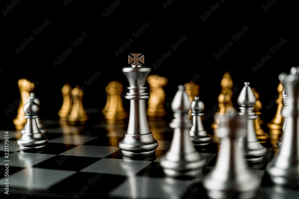 business strategy brainstorm chess board game with hand touch black background with free copy space for your text business strategy brainstorm chess board game with hand touch black background with free copy space for your text