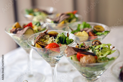 triangular Martini glass with a vegetable salad