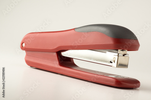 stapler for stapling papers on a table