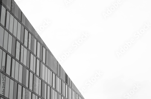 Stunning architectural diagonal shape building with blank space. Black and white