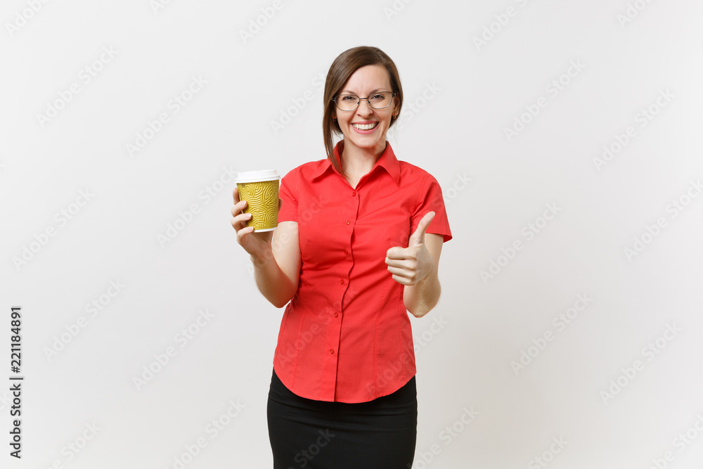 Portrait of happy smiling young business teacher woman in red shirt glasses holding cup of coffee or tea in hands isolated on white background. Education or teaching in high school university concept. Portrait of happy smiling young business teacher woman in red shirt glasses holding cup of coffee or tea in hands isolated on white background. Education or teaching in high school university concept.