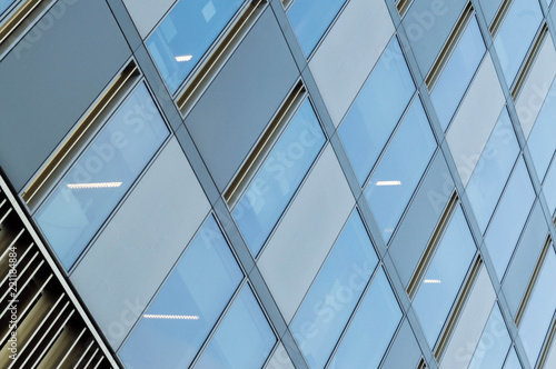 Business architecture building with glass windows and dynamic lines