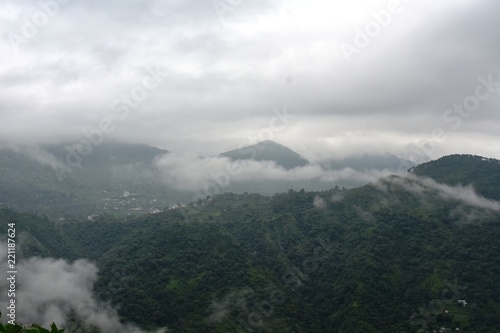 clouds in mountains in landscape