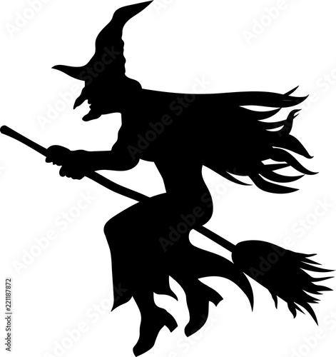 Silhouette of a witch on a broomstick