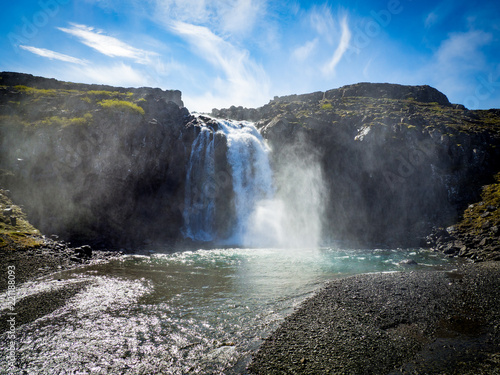 Waterfall in the sun in Iceland
