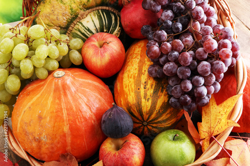 Autumn nature concept. Fall fruit and vegetables on wood. Thanksgiving dinner.