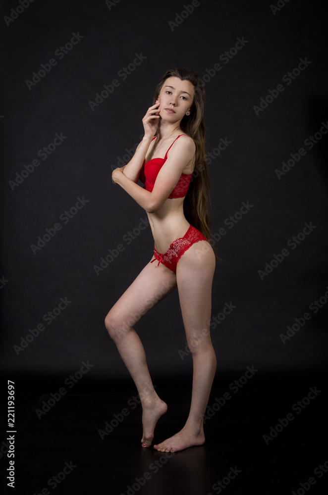Young woman in red underwear.